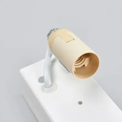 Jasin - vegglampe med gullfarget overflate