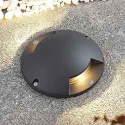 Lindby gulv-spotlight med LED Cormac, 2 lyskilder, Ø 21 cm, IP67