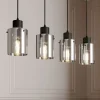 Lindby hengelampe Kourtney, 4 lyskilder, svart/grå, glass, E27