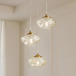 Lindby hengelampe Piatra, Ø25cm, 3 lyskilder, cognac/messing, glass