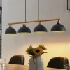 Lindby hengelampe Tirzana, 4 lyskilder, svart, metall, tre