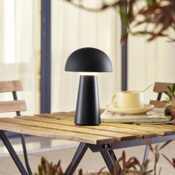 Lindby Zyre LED oppladbar bordlampe, svart, IP44, berøringsdimmer