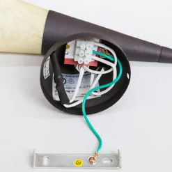 Lindby-vegglampe Alva, rustfarget, glass, 34 cm høy, E14