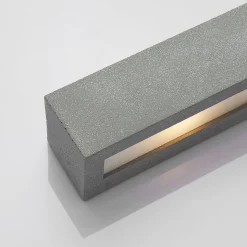 Lindby-vegglampe Nellie, grå, betong, 35,3 cm bred