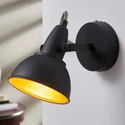 Svart-gyllen vegglampe Julin